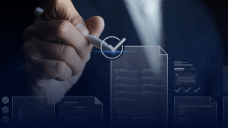 Professional reviewing digital controls and documentation, representing the challenges of auditing AI-enabled processes, governance, risk management, and assurance.